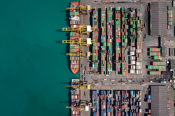 container-ship-sea-port-working-crane-bridge-loading-container-import-export-international-by-shipping-transportation-concept-photograph-from-drone